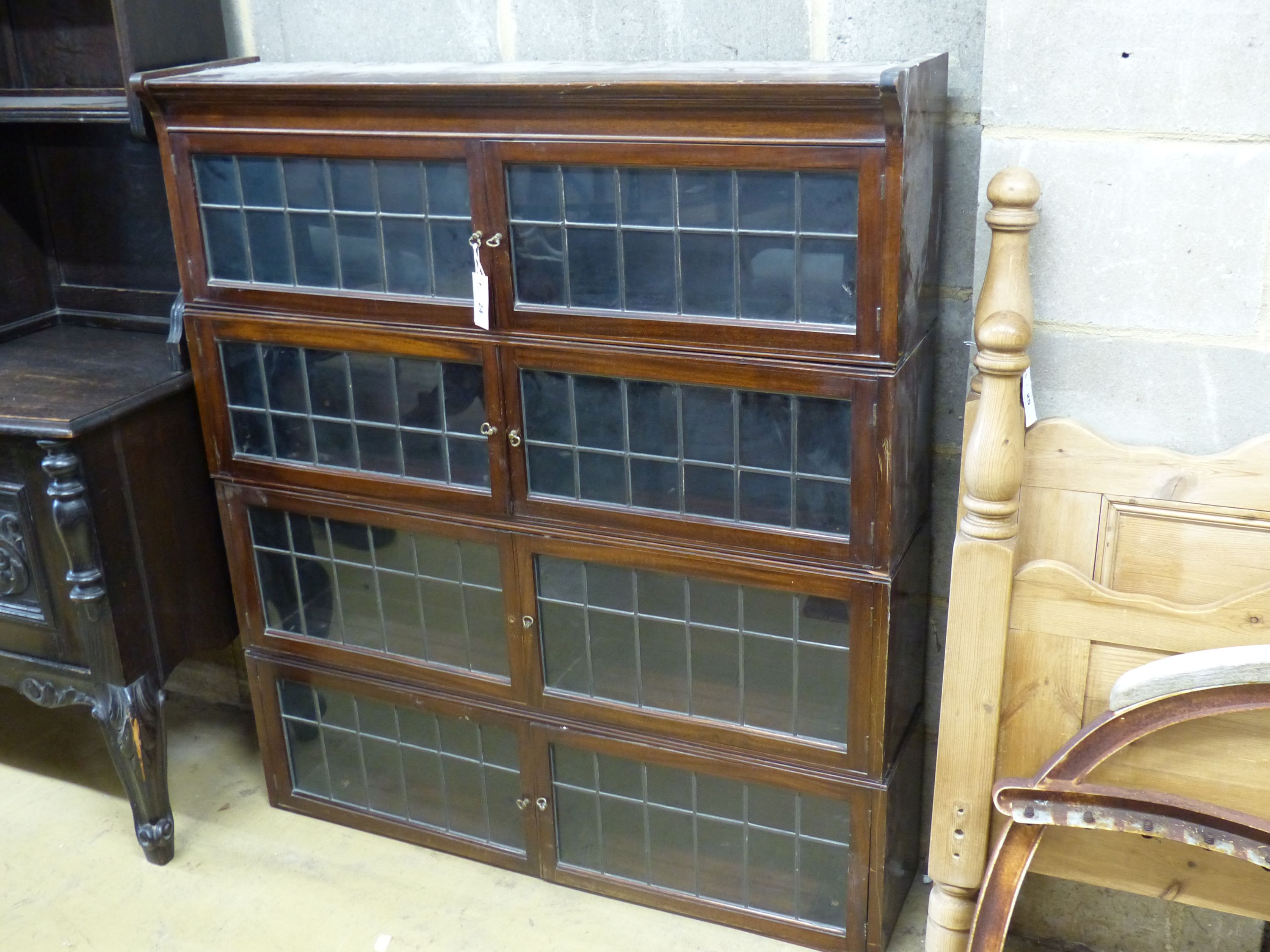 A Globe Wernicke style mahogany four section bookcase, no base, width 106cm depth 236cm